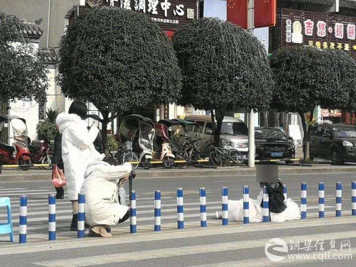 险中求美？ 铜梁一女子居然马路中间拍写真~